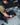 Fitting interlocking garage floor tiles